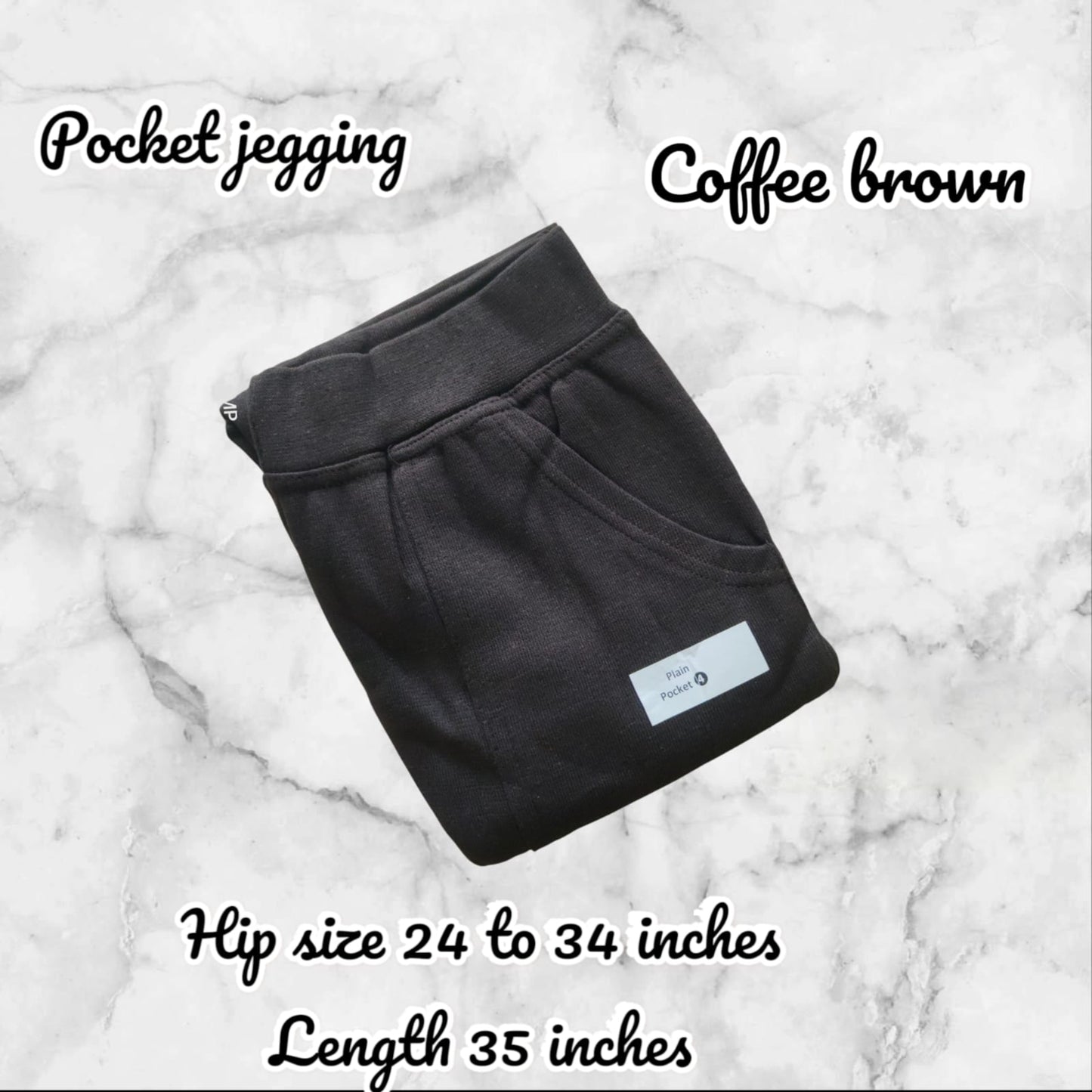 Coffee brown pocket jegging on a marble background with product details.