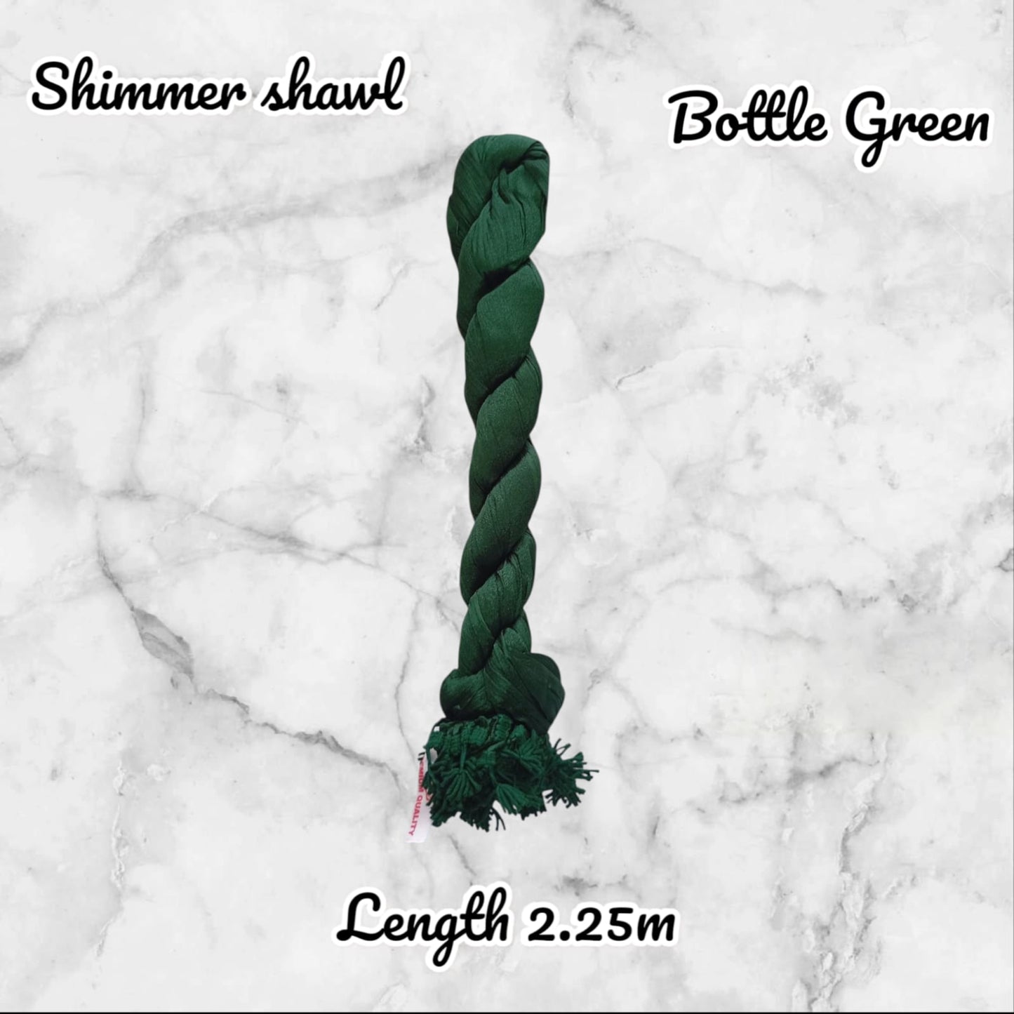 Green braided toy with text indicating color and length on a marble background