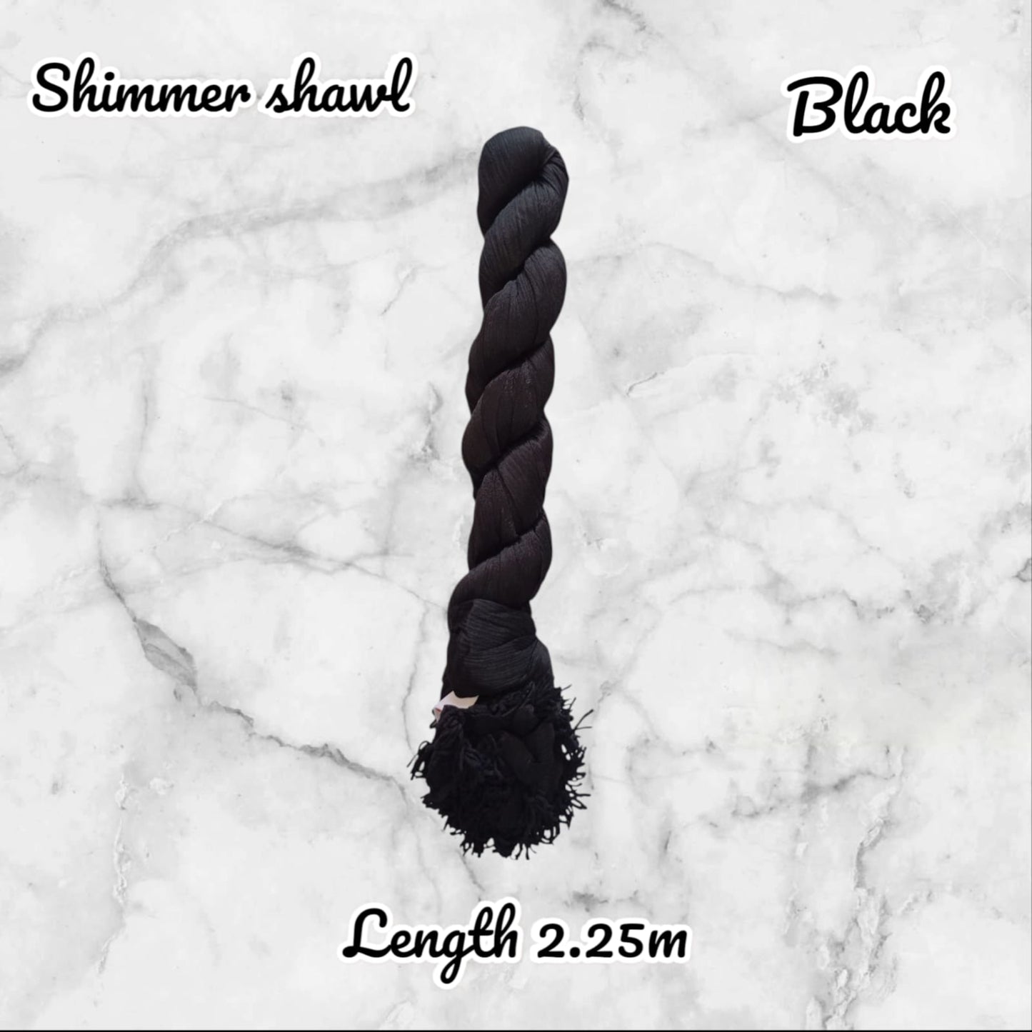 Black shimmer shawl on a marble background with text indicating length.