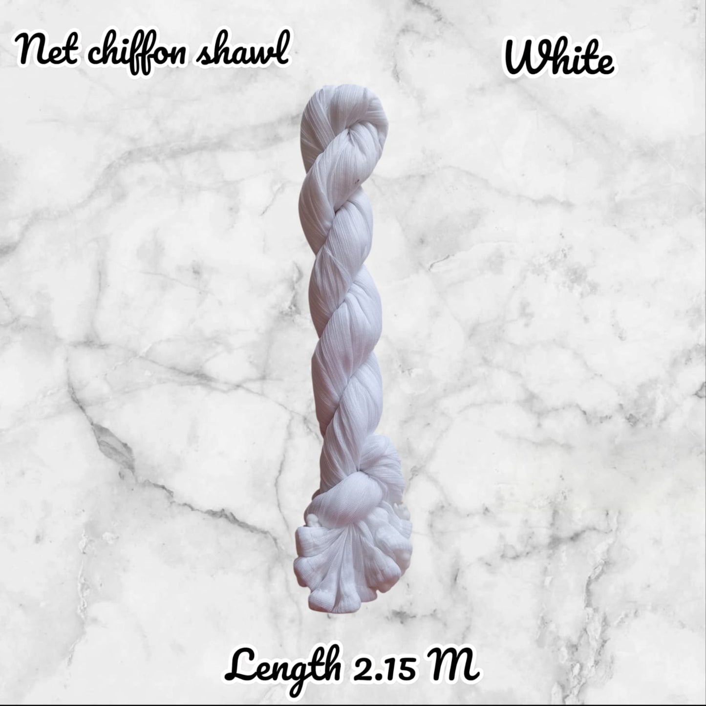 White net chiffon shawl on a marble background