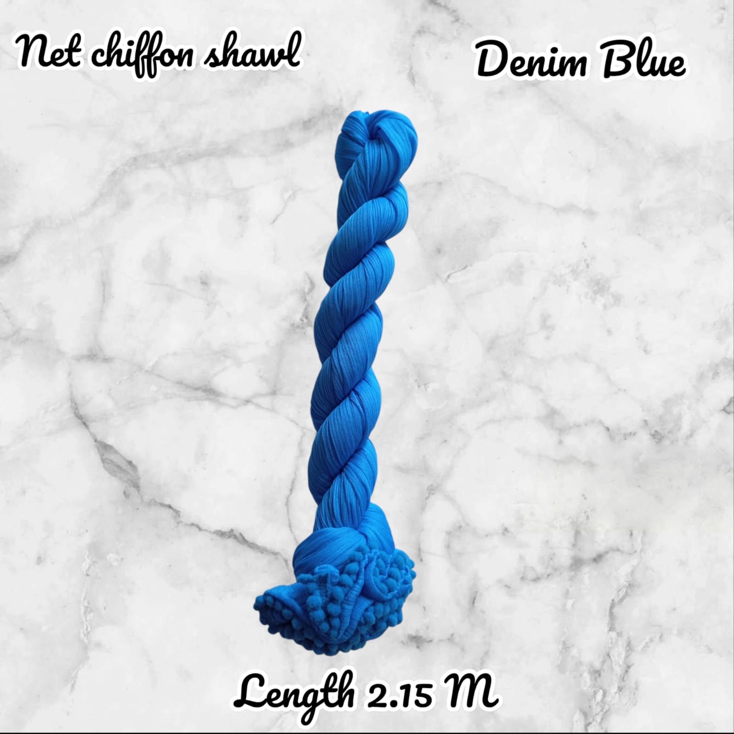 Blue yarn skein on a marble background with text indicating 'Net chiffon shawl' and 'Denim Blue'.