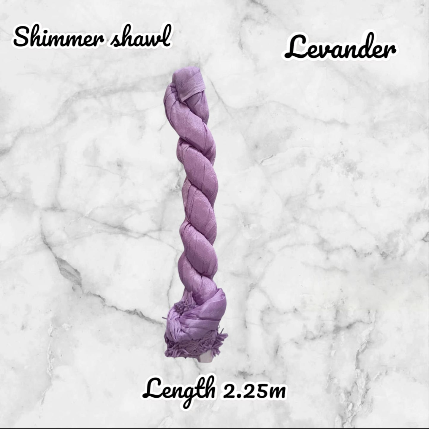 Purple braided shawl labeled 'Shimmer shawl' and 'Levander' on a marble background.