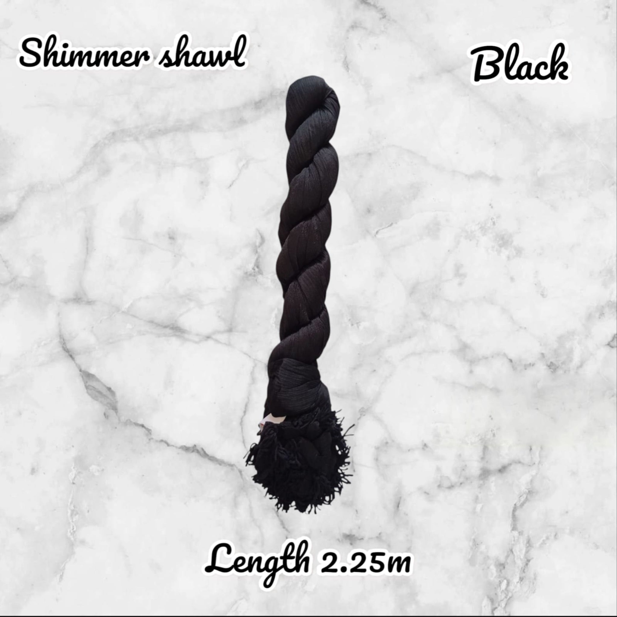 Black shimmer shawl on a marble background with text indicating length.