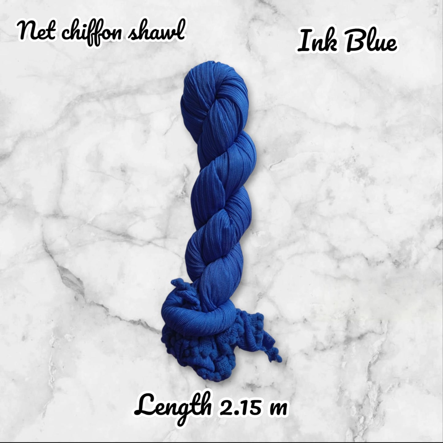 Ink Blue chiffon shawl on a marble background